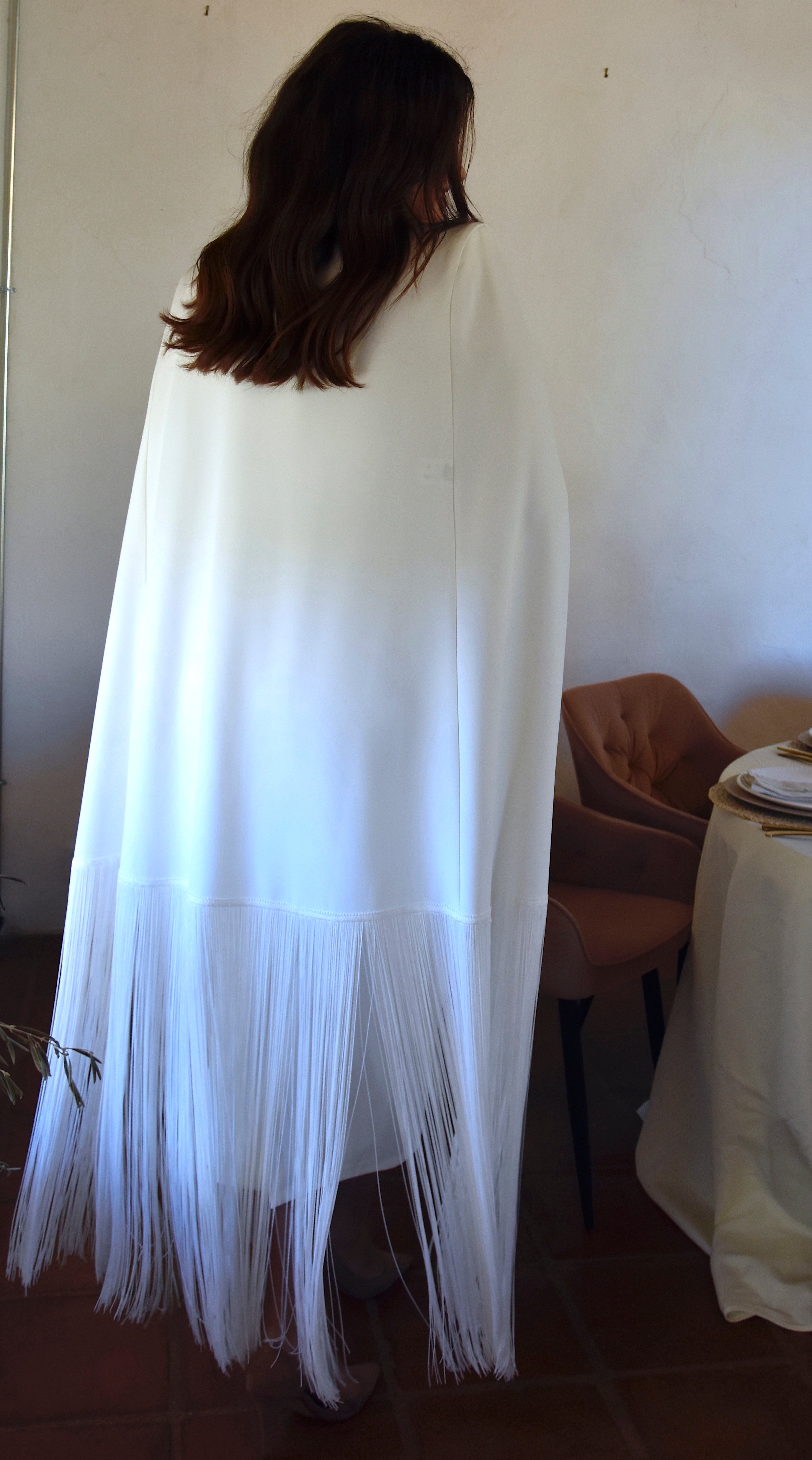 Vestido Moom: Movimiento y Distinción con Flecos